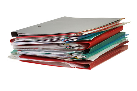 Stack of hanging file folders on white background with Clipping Path.