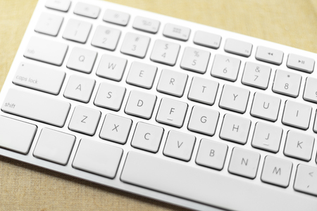 Close up of keyboard of a modern computer on canvas background