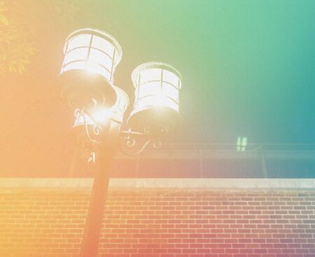 Street lamp illuminated in white light. Urban illumination at nightの写真素材