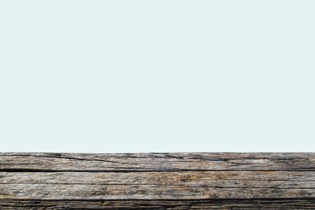 image of wooden table in front of abstract blurred background