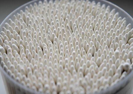Cotton buds on white background.の写真素材