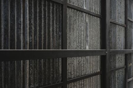 Rusted galvanized iron plate and background photoの写真素材