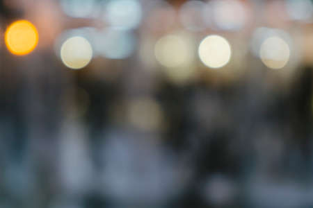 defocused bokeh background of garden treesの写真素材
