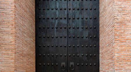 Ancient Chinese black door decorate in the cityの写真素材