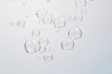 Photo of an air bubbles  on light grey background AI generatedの素材