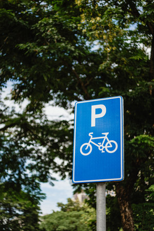 Bicycle parking, blue three-dimensional sign of P and bicycleの写真素材