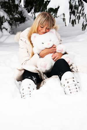 Girl fotoset in winter forestの写真素材