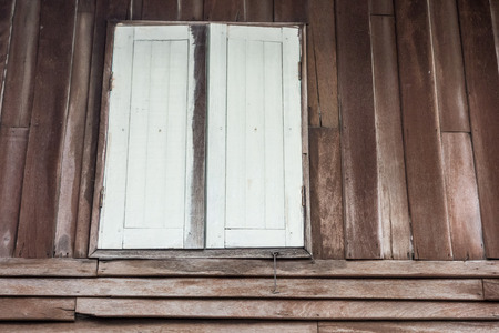 Grunge wooden window-Tropical house, Spotted wood wallの写真素材