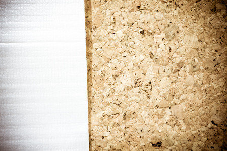 Paper foam packaging on cork board,use as backgroundの写真素材