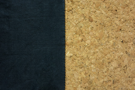Black fabric with zig zag edge on cork board,backgroundの写真素材