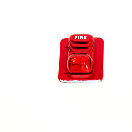 A fire alarm with built in strobe light ,alert in case of fire.の写真素材