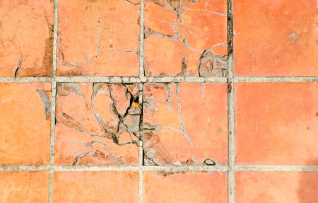 crack tiles square clay orange floor.の写真素材