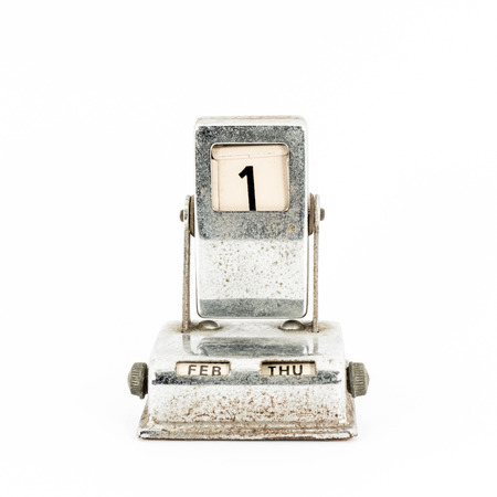 Vintage rusty flip calendar on white backgroundの写真素材