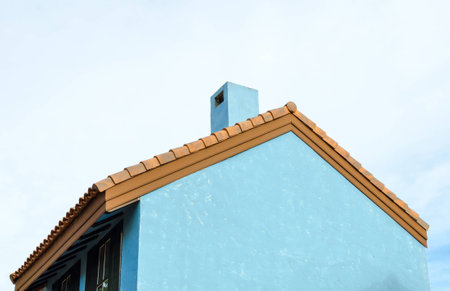 Blue Italian chimmy house style with sky  