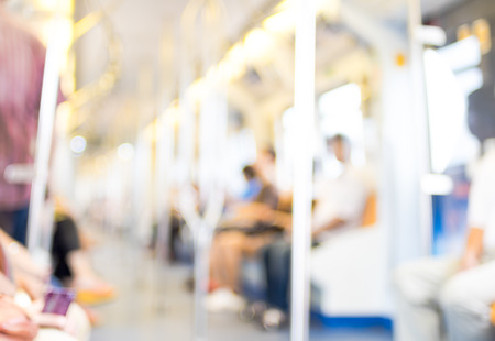 Blurred background : People at electric sky train.