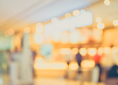 Blurred background : Customer at coffee shop blur background with bokeh,vintage filter.