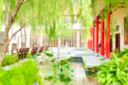 chinese garden wtih gteen tree and pond.の写真素材