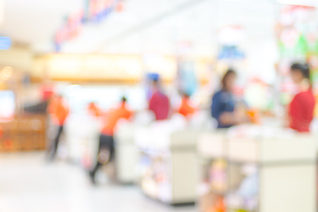 Supermarket store blur background ,Cashier counter with customer.の写真素材