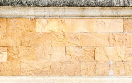 Sand stone brick wall,texture background.
