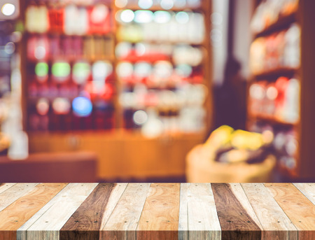 Empty wood table and blurred cafe light background. product display template.Business presentation.の写真素材