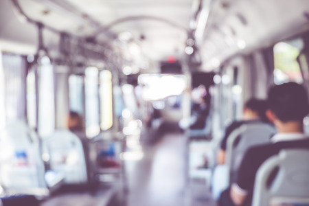 blur background people in public transportation bus,abstract background. blur background people in public transportation bus,abstract background.