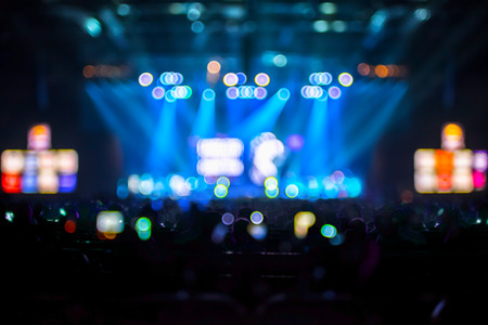 Blurred background : Bokeh lighting in concert with audience ,Music showbiz concept.