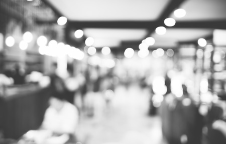 Blurred background : Customer at cafe blur background with bokeh light, Black and white filter.の写真素材