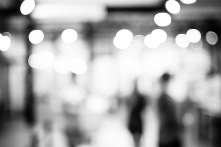 Blurred background : Customer at cafe blur background with bokeh light, Black and white filter.の写真素材
