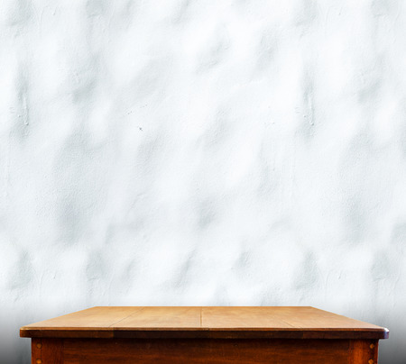 wooden tabletop at ripple concrete wall,Template mock up for display of product,Business...