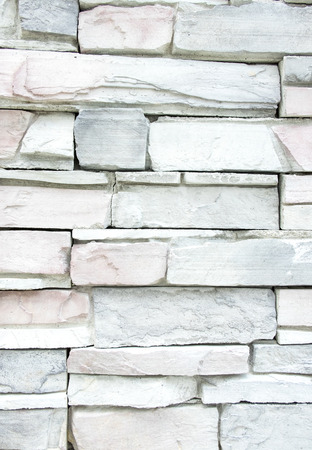 Stack of stone layer wall,texture background.の写真素材