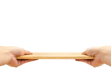 Two hand holding food plate made from wood isolated on white background, Template mock up for adding your product and leave space for adding content , Clipping path on object.の写真素材