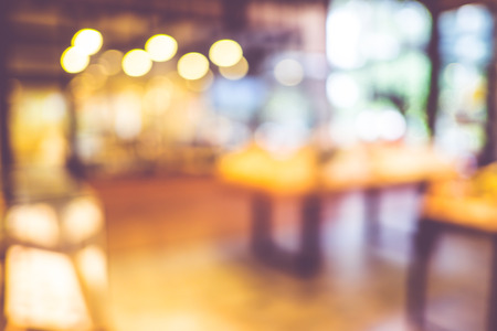 Blurred background : Vintage filter ,Customer in Coffee shop blur background with bokeh.の写真素材