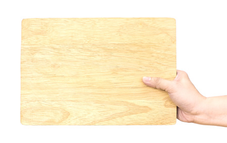 Hand holding wood plate isolated on white background, Template mock up for adding menu or another content, Clipping path on object.の写真素材
