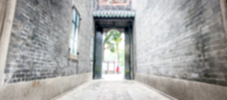 Blur background, Old alley build with stone.の写真素材