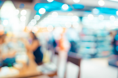 Blurred background : Vintage filter ,Customer in Coffee shop blur background with bokeh.の写真素材