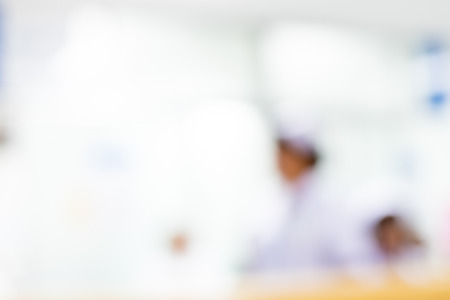 Blurred background : Vintage filter nurse at hospital counterの写真素材