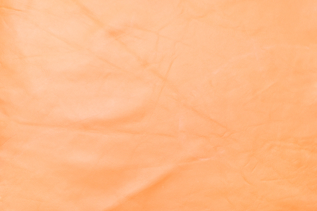 orange leather texture backgroundの写真素材