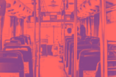 Abstract blur background, Inside of public bus with seat and people in duo tone color style.の写真素材