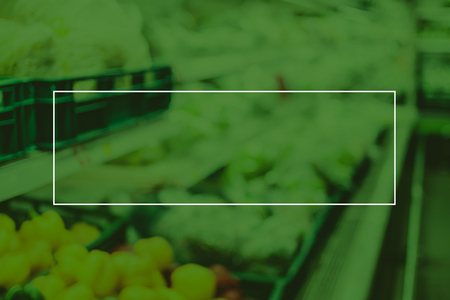 Empty white frame on green Duotone of blur grocery store background, Mock up for adding your text.の写真素材