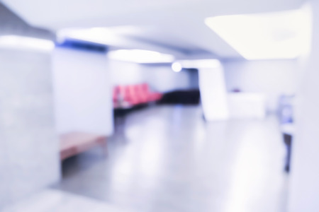 Abstract Blurred background: Office Building hallway ,business centre,blue tone.の写真素材