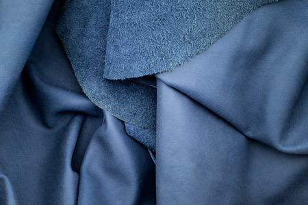 Close up fold navy blue leather texture background,fabrics Division.の写真素材