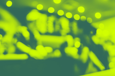 Blue and green Duo tone of blur woman at coffee shop counter bar,  abstract background leave space for adding your text.の写真素材