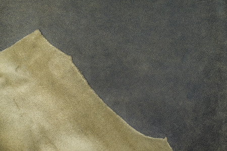 Close up fold grey leather texture background,fabrics Division.