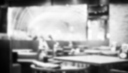 Blurred background,Customer dinner at restaurant with bokeh light,Muted vintage filter.