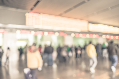 Blurred background : people queuing to buy a public transport auto ticket,Transportation concept,vintage filtered.の写真素材