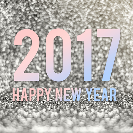 happy new year 2017 in material color at silver sparkling glitter background.