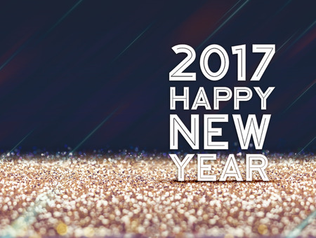 2017 Happy New year in gold and dark purple color abstract glitter background, Holiday concept design,Leave space for adding your content.の写真素材
