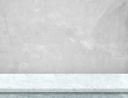Empty whtie marble table top with grey concrete wall,Mock up for display or montage of product,use as background.の写真素材