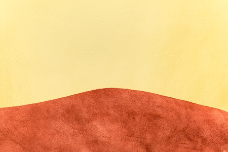 Close up beige and tan leather divide two section, texture background,fabrics Division.の写真素材