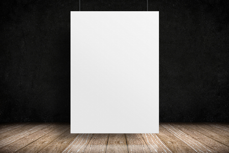 White paper poster hanging in wood floor and rough blackboard wall, Room perspective,grunge background,Mockups for display of design or content.の写真素材